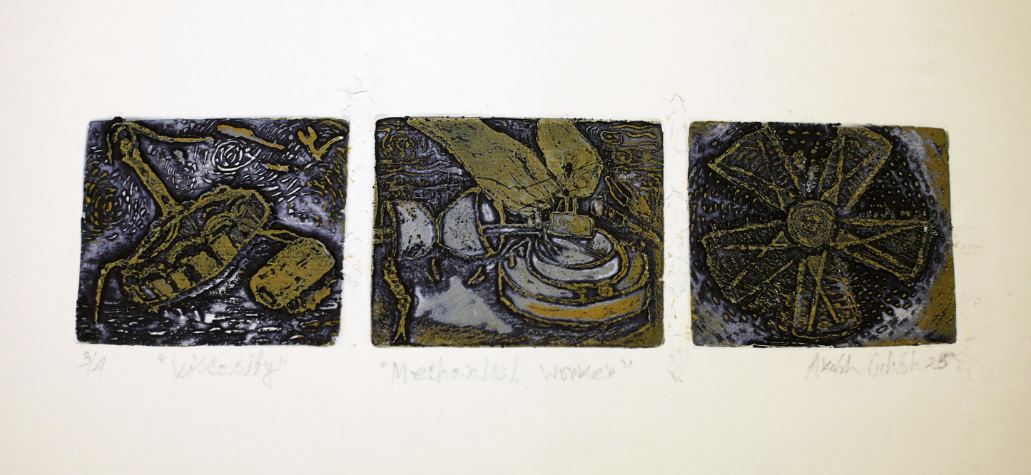 Three square tiles with artistic designs in black and gold on a beige background